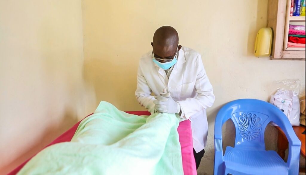 A man standing in a therapy room.