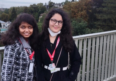 Asha and Shruti smile for the camera